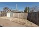 The property includes a single-car detached garage and a privacy fence at 1718 Gilmore St, Columbus, IN 47201