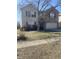 Charming two-story home featuring brick and siding, with a well-maintained lawn and mature landscaping at 1735 Sonesta Ln, Indianapolis, IN 46217
