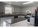 Bright kitchen showcasing countertops, modern appliances, and an island perfect for Gathering gatherings at 1735 Sonesta Ln, Indianapolis, IN 46217