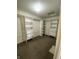 A large walk-in closet features ample storage with shelving and built-in drawers for organization at 1735 Sonesta Ln, Indianapolis, IN 46217