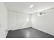 Unfinished basement shows bright white painted walls with a small window at 1953 N Linwood Ave, Indianapolis, IN 46218