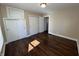 Cozy bedroom with wood floors and double closets at 2341 California St, Columbus, IN 47201