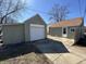 Exterior view of a garage and home with driveway at 2341 California St, Columbus, IN 47201