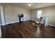 Bright living room features wood floors and natural light at 2341 California St, Columbus, IN 47201