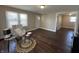Bright living room features wood floors and natural light at 2341 California St, Columbus, IN 47201