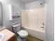 Bright bathroom with tub, shower combo and a modern vanity at 2365 Grand Fir Dr, Greenwood, IN 46143