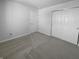 Comfortable bedroom with a closet and multiple doors at 2365 Grand Fir Dr, Greenwood, IN 46143