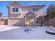 Charming two-story home featuring a yellow front door and attached garage, surrounded by a snow-covered yard at 2365 Grand Fir Dr, Greenwood, IN 46143