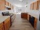 Bright kitchen featuring wood cabinets, stainless steel appliances, and durable countertops at 2365 Grand Fir Dr, Greenwood, IN 46143