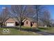 Charming one-story brick home with a well-manicured lawn and an attached two-car garage at 2731 Trailridge Ct, Martinsville, IN 46151