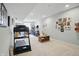 Spacious finished basement provides flexible living space for recreation and exercise with treadmill at 2750 Joshua Dr, Carmel, IN 46033