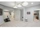 Spacious finished basement with neutral carpet and access to a bathroom at 2750 Joshua Dr, Carmel, IN 46033