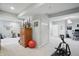 Open finished basement area with neutral carpet and ample space at 2750 Joshua Dr, Carmel, IN 46033