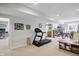 Spacious finished basement provides flexible living space for recreation and exercise with treadmill at 2750 Joshua Dr, Carmel, IN 46033