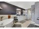 Elegant bathroom with a free-standing tub, modern vanity, and neutral wall colors at 2750 Joshua Dr, Carmel, IN 46033
