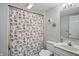 Bathroom with a fun colorful shower curtain and neutral colors at 2750 Joshua Dr, Carmel, IN 46033