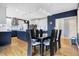 Modern eat-in kitchen with stainless steel appliances, island with seating, and stylish cabinets at 2750 Joshua Dr, Carmel, IN 46033