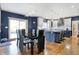 Modern eat-in kitchen with stainless steel appliances, island with seating, and stylish cabinets at 2750 Joshua Dr, Carmel, IN 46033