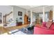 Bright and airy living room featuring hardwood floors, and seamless access to other living spaces at 2750 Joshua Dr, Carmel, IN 46033