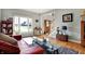 Bright living room featuring hardwood floors, neutral decor, and lots of natural light at 2750 Joshua Dr, Carmel, IN 46033