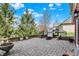 Wonderful outdoor patio space with mature trees, plantings and beautiful pavers at 2750 Joshua Dr, Carmel, IN 46033