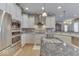 Gourmet kitchen boasting granite counters, a stainless steel range, and a center island at 2861 Shadwell Pl, Greenwood, IN 46143