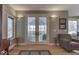 Open living area showcasing the sunroom access, decor and bright natural light at 2861 Shadwell Pl, Greenwood, IN 46143