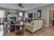 Cozy living room with fireplace, hardwood floors, and comfortable seating area at 2861 Shadwell Pl, Greenwood, IN 46143