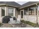 An inviting patio area features an outdoor seating area and grill, perfect for entertaining or enjoying a quiet evening at 2861 Shadwell Pl, Greenwood, IN 46143