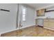 This kitchen is equip with stainless steel dishwasher, tan cabinets, and granite countertops at 3044 S Keystone Ave, Indianapolis, IN 46237