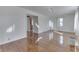 Inviting living room with hardwood floors, creating a warm and welcoming atmosphere at 3044 S Keystone Ave, Indianapolis, IN 46237