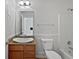Bathroom featuring a sink, vanity, toilet and shower at 3153 Underwood Dr, Whiteland, IN 46184