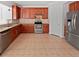 Well-appointed kitchen featuring stainless steel appliances, granite countertops, and stylish cabinetry at 3153 Underwood Dr, Whiteland, IN 46184
