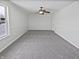 Living room featuring new carpet and natural light from the window at 3153 Underwood Dr, Whiteland, IN 46184