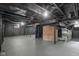 The basement features exposed joists and duct work and a brick column at 3701 N Temple Ave, Indianapolis, IN 46218