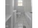 The bathroom features tile floors, a vanity, a toilet, and a tub at 3701 N Temple Ave, Indianapolis, IN 46218