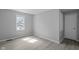 Clean bedroom with laminate flooring, fresh paint, and ample natural light, ready for personalization at 3701 N Temple Ave, Indianapolis, IN 46218