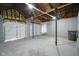 The garage with two garage doors and overhead storage at 3701 N Temple Ave, Indianapolis, IN 46218