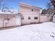 Backyard featuring new siding and snow-covered lot at 3743 Celtic Dr, Indianapolis, IN 46235