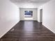 Clean living room boasting hardwood floors and natural lighting at 3743 Celtic Dr, Indianapolis, IN 46235