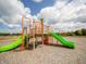 Community playground featuring slides, climbing structures, and a soft landing surface at 3912 Bamboo Branch Dr, Clayton, IN 46118