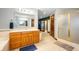 Bathroom features a vanity, a shower, a bathtub, neutral walls, and tile flooring at 3949 W 250 N, Anderson, IN 46011