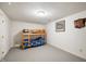 Bedroom featuring a bunk bed with colorful bedding and a carpeted floor at 3949 W 250 N, Anderson, IN 46011