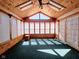 Bright sunroom with wood paneling, skylights, and windows all around at 4109 E Epler Ave, Indianapolis, IN 46237