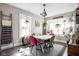 Bright dining room featuring modern furniture, indoor plants, and a cozy atmosphere for meals at 4429 Crittenden Ave, Indianapolis, IN 46205