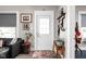 Cozy entryway with a white door, stylish decor, and modern accents to welcome guests at 4429 Crittenden Ave, Indianapolis, IN 46205
