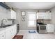 Functional kitchen featuring ample counter space, modern appliances, and well-organized storage at 4429 Crittenden Ave, Indianapolis, IN 46205