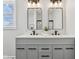 Modern bathroom with double sink vanity, black hardware, and lots of storage at 4844 N 700 W, McCordsville, IN 46055