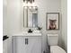 Charming bathroom with white vanity, koala art and modern fixtures at 4844 N 700 W, McCordsville, IN 46055