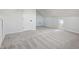 Upper-level bedroom featuring neutral decor, carpet flooring, and closet at 4844 N 700 W, McCordsville, IN 46055